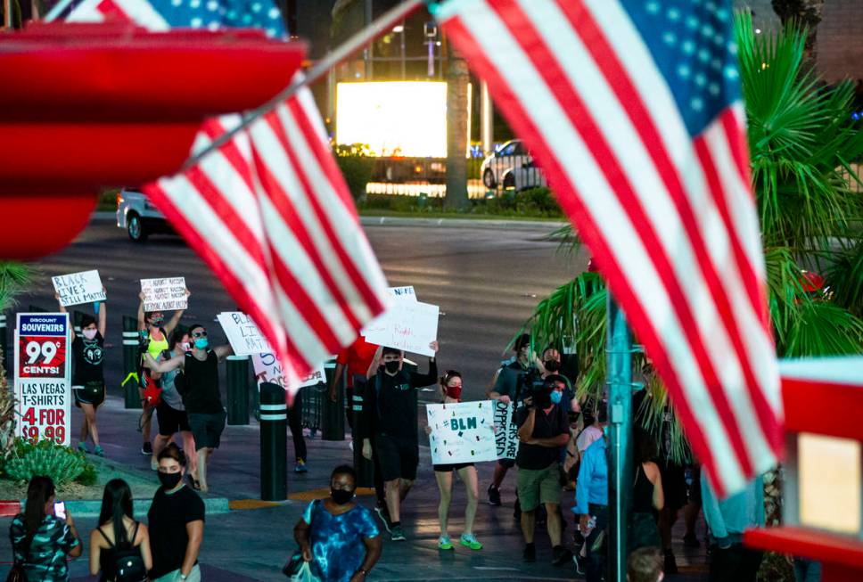 People march during a Black Lives Matter rally on the Las Vegas Strip on Saturday, July 25, 202 ...