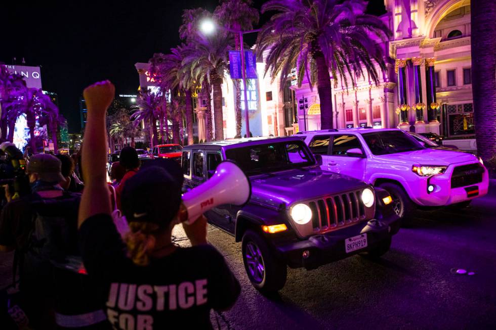 People march during a Black Lives Matter rally on the Las Vegas Strip on Saturday, July 25, 202 ...