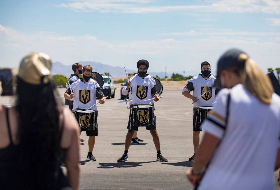 The Golden Knights drum line performs for fans as they wait to send off Golden Knights players ...