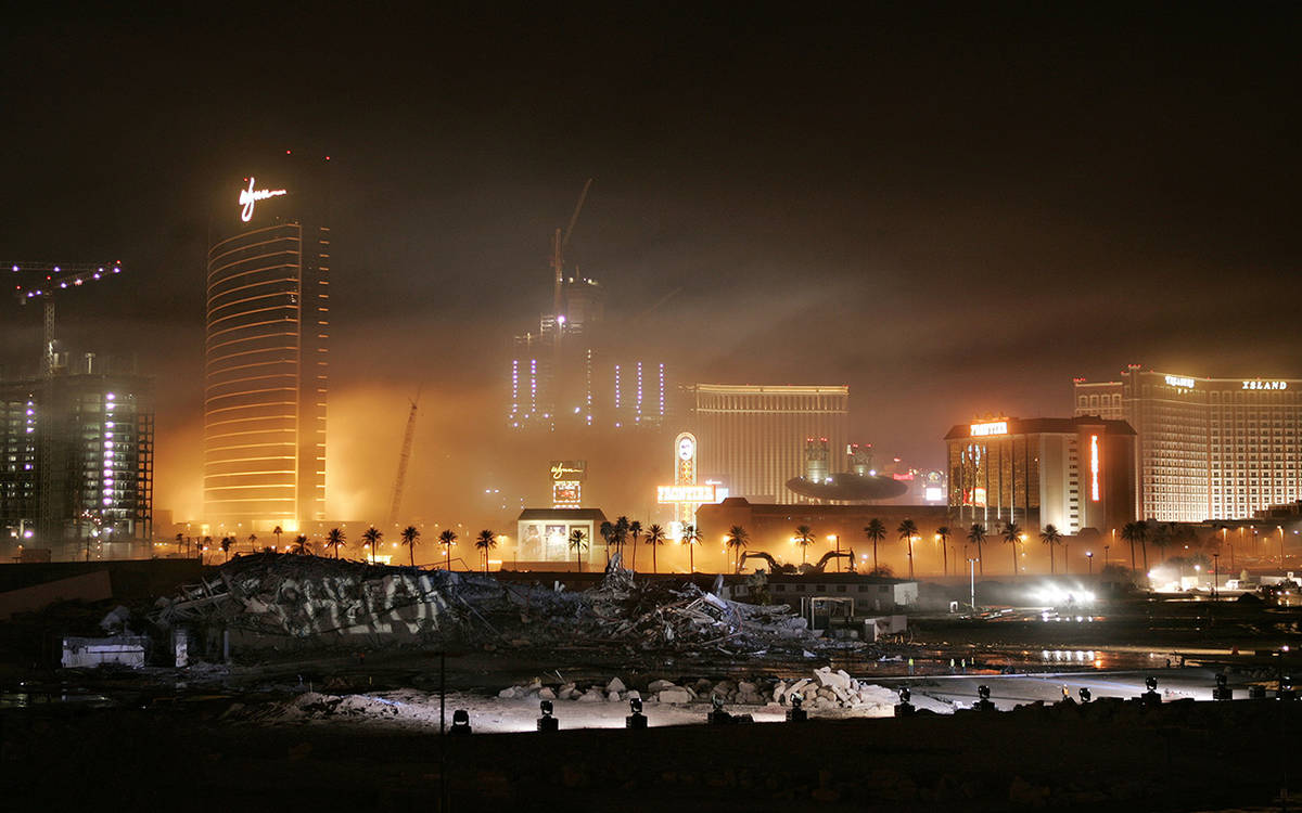 Dust hangs in the air after the Stardust hotel-casino was imploded early Tuesday morning, March ...
