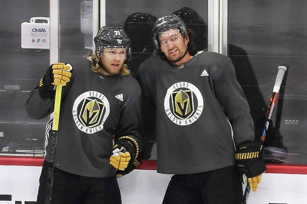 Vegas Golden Knights center William Karlsson (71), left, talks with right wing Mark Stone (61) ...