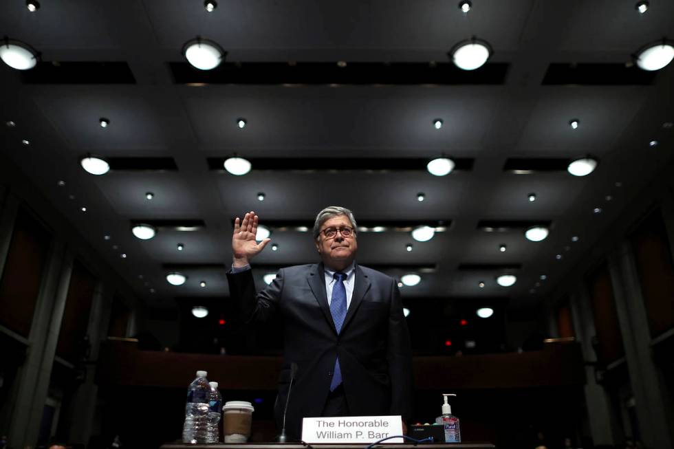 Attorney General William Barr is sworn in before testifying before a House Judiciary Committee ...