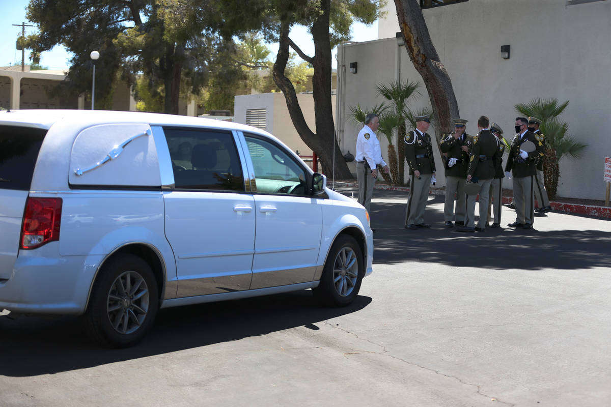 The Las Vegas Metropolitan Police Department Honor Guard outside of the Palm Downtown Mortuary ...