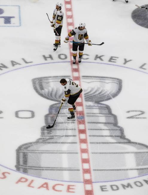 Vegas Golden Knights' Brayden McNabb (3), Mark Stone (61) and Nick Cousins (21) warm-up before ...