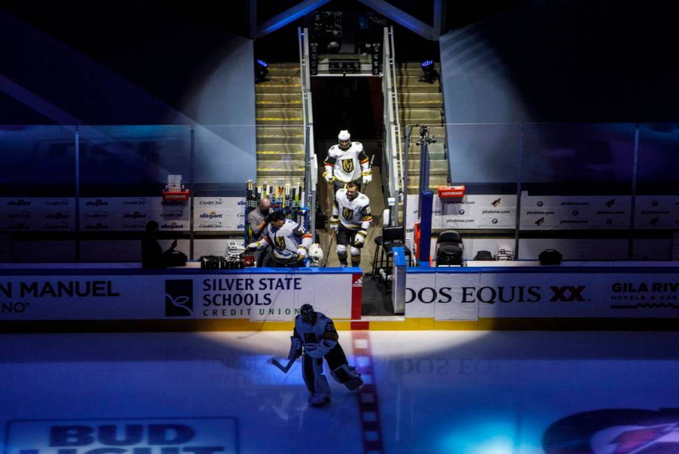 The Vegas Golden Knights take to the ice to warm up for an NHL hockey exhibition game against t ...