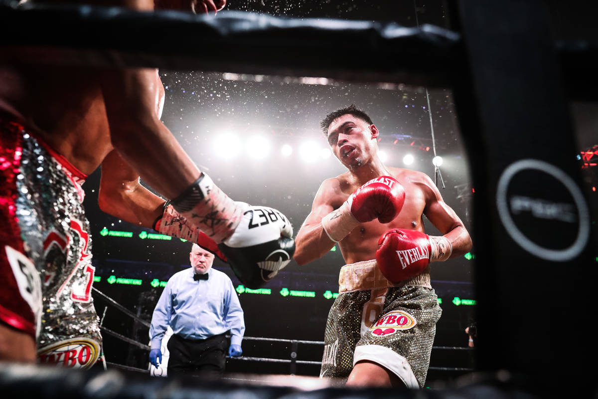 Angelo Leo (right) fights Cesar Juarez on Dec. 28, 2019, at State Farm Arena in Atlanta, Georgi ...