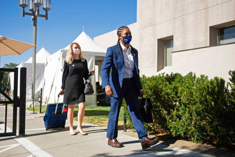 State Senators Dallas Harris, right, and Melanie Scheible arrive at the Legislature on Friday, ...