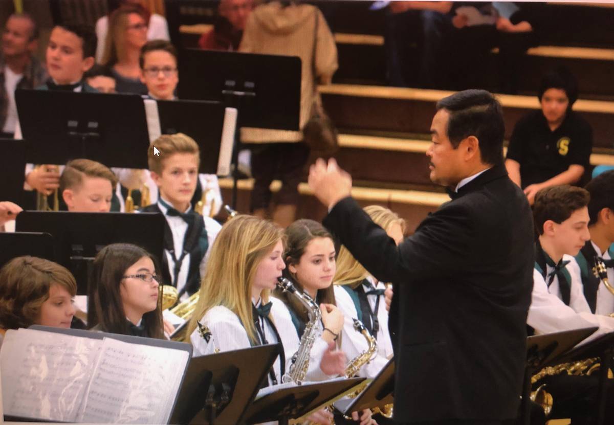 Mark Nekoba conducts a Schofield Middle School band. (Photo courtesy of Mark Nekoba)