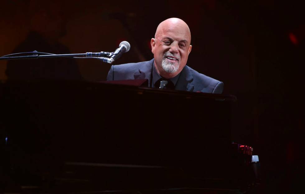 Musician Billy Joel performs during his 100th lifetime performance at Madison Square Garden on ...