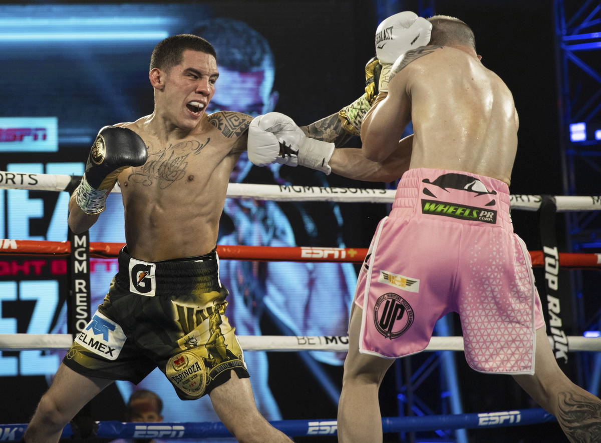 Oscar Valdez, left, lands a left hook against Jayson Velez during their jr. lightweight fight d ...
