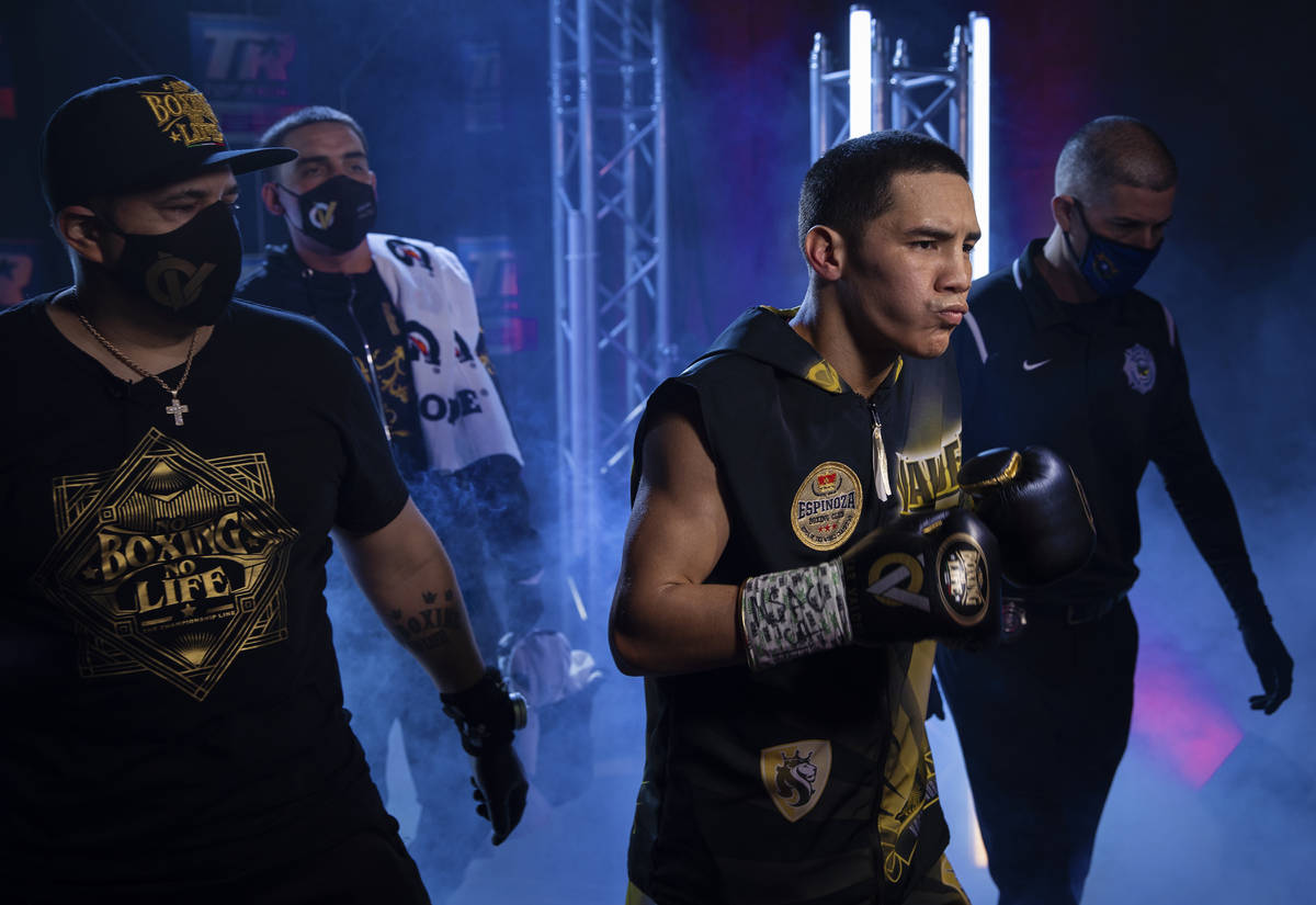 Oscar Valdez, front/right, enters the ring before the start of his jr. lightweight fight with J ...