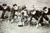 This 1918 Washington University file photo shows the university football players wearing protec ...