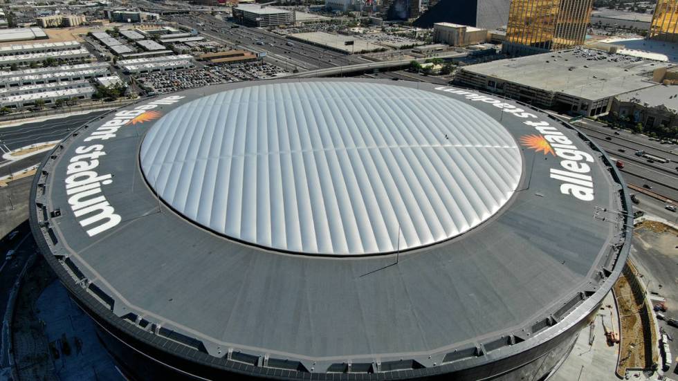 Aerial view of Allegiant Stadium roof top logos that will light up at night on Wednesday, July ...