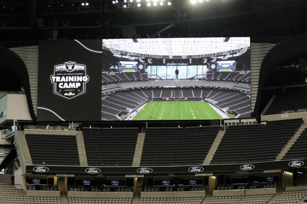 A TV screen near the south end zone at Allegiant Stadium in Las Vegas, Friday, Aug. 21, 2020. ( ...