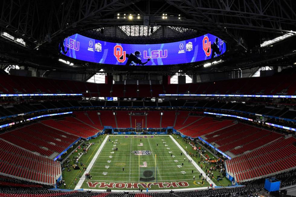 FILE - In this Dec. 28, 2019, file photo, the Mercedes-Benz stadium is shown prior to the Peach ...