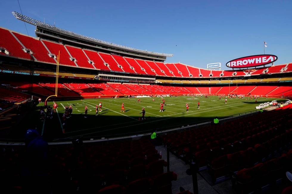 Socially distanced fans watch the Kansas City Chiefs during an NFL football training camp Satur ...