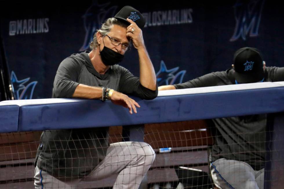 FILE - In this Sunday, July 12, 2020, file photo, Miami Marlins manager Don Mattingly watches a ...