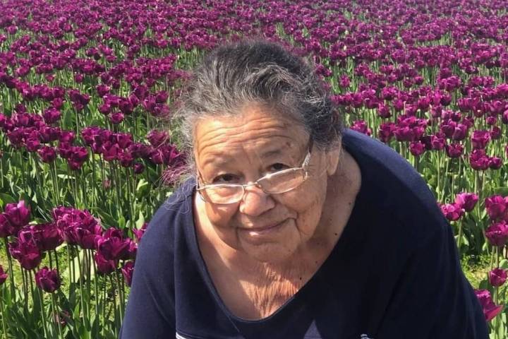 An undated photo of Maria Urrabazo in a field of flowers. Urrabazo died on June 3, 2020, from C ...