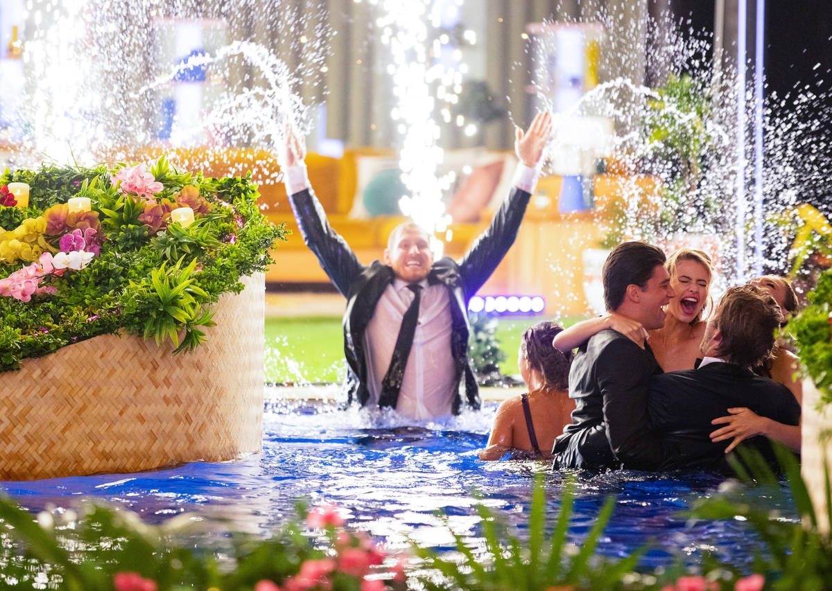 Cast members celebrate in the pool during the final episode of "Love Island" on August 7, 2019. ...