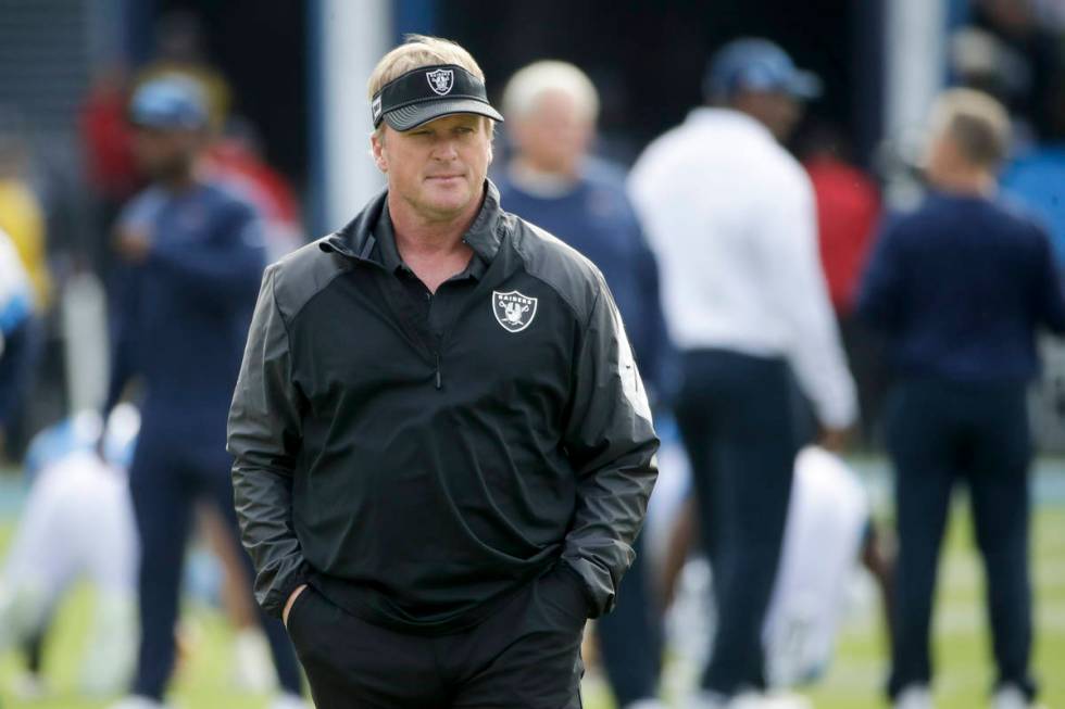 Oakland Raiders head coach Jon Gruden watches during warm ups before an NFL football game again ...