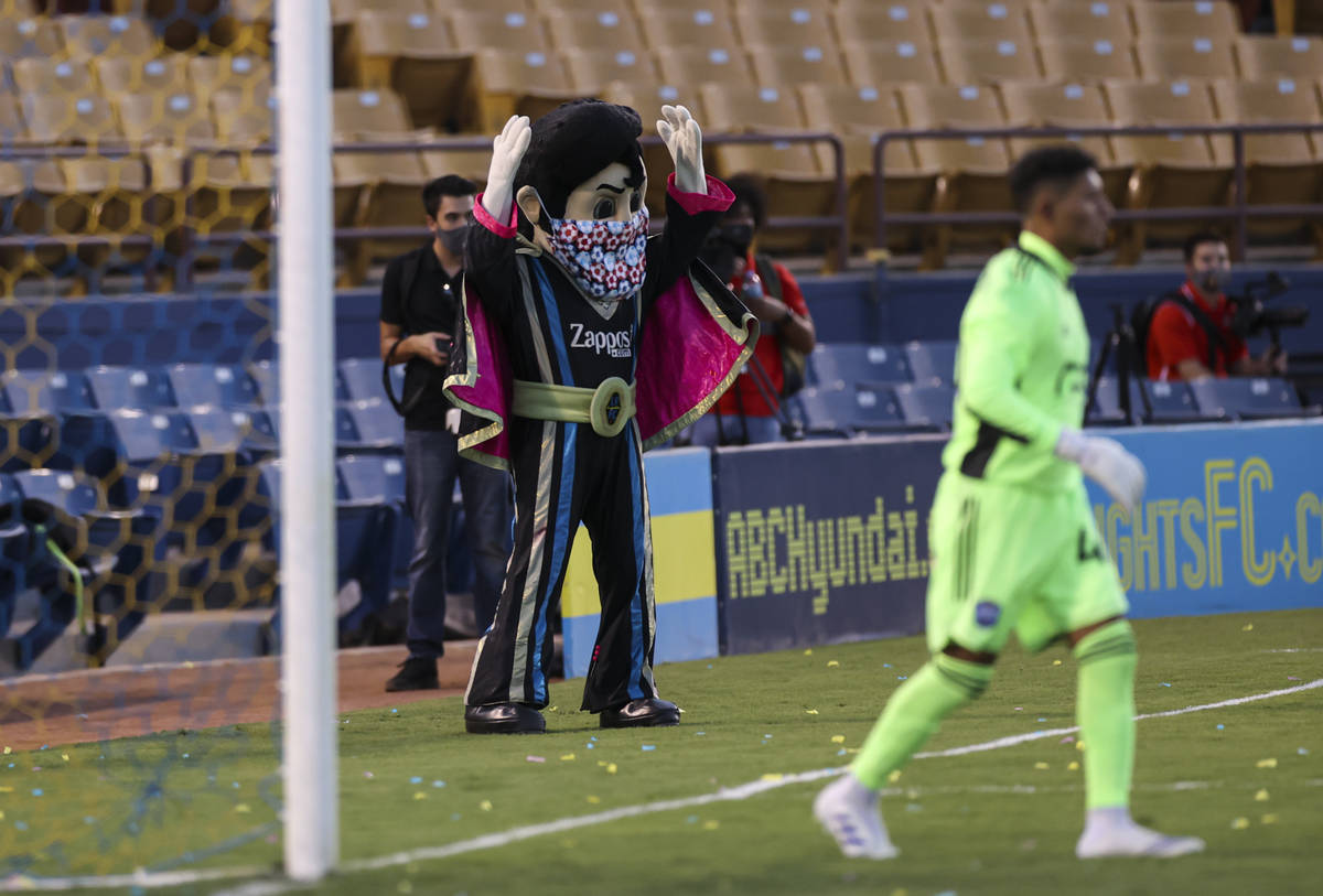 Las Vegas Lights FC mascot Cash reacts during the first half of a USL soccer game against Reno ...