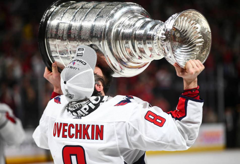 Washington Capitals left wing Alex Ovechkin (8) celebrates after defeating the Golden Knights i ...