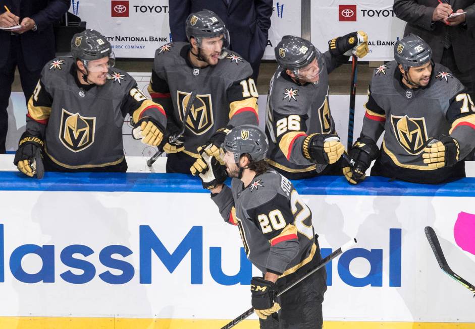 Vegas Golden Knights' Chandler Stephenson (20) celebrates a goal against the Dallas Stars durin ...