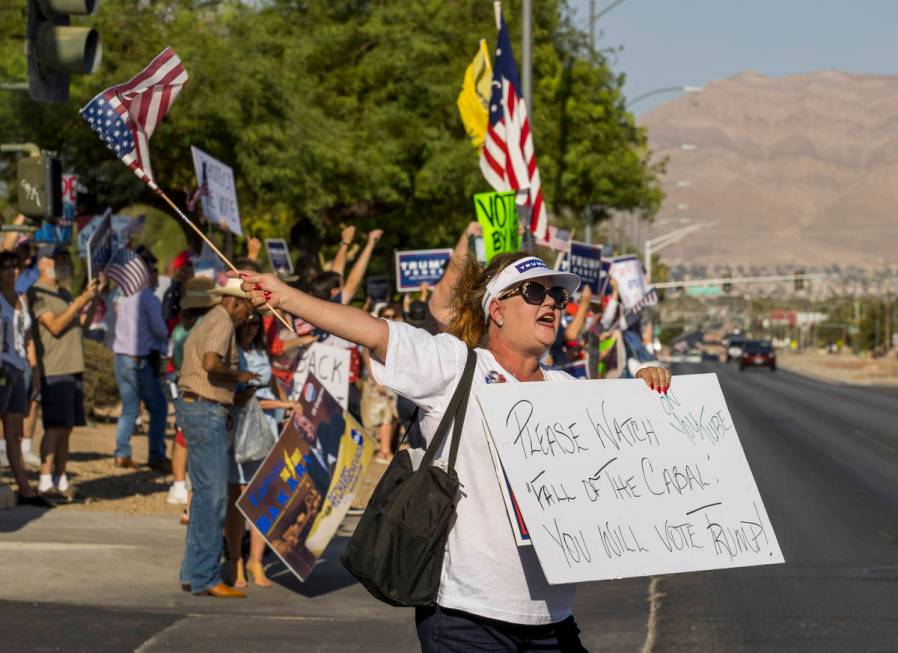 Protestor Delta Remington yells out in front of the Grant Sawyer building to voice opposition a ...