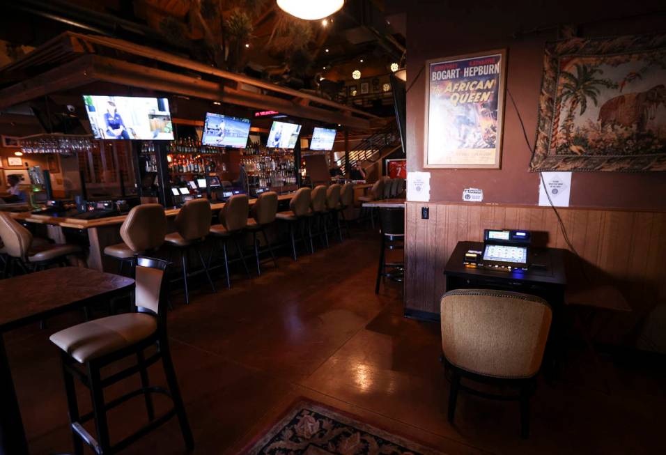 A gaming machine that was formerly at the bar is seen in a lounge area at Black Mountain Grill ...