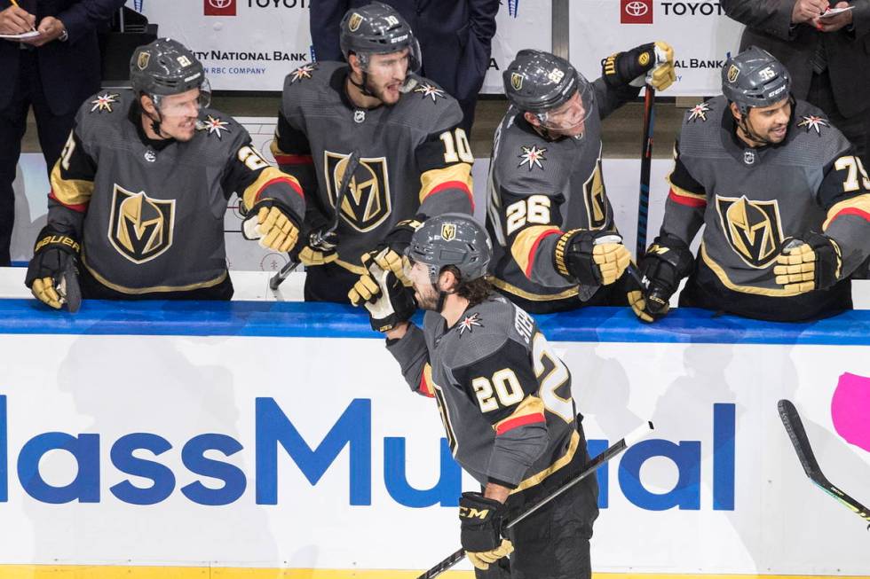 Vegas Golden Knights' Chandler Stephenson (20) celebrates a goal against the Dallas Stars durin ...