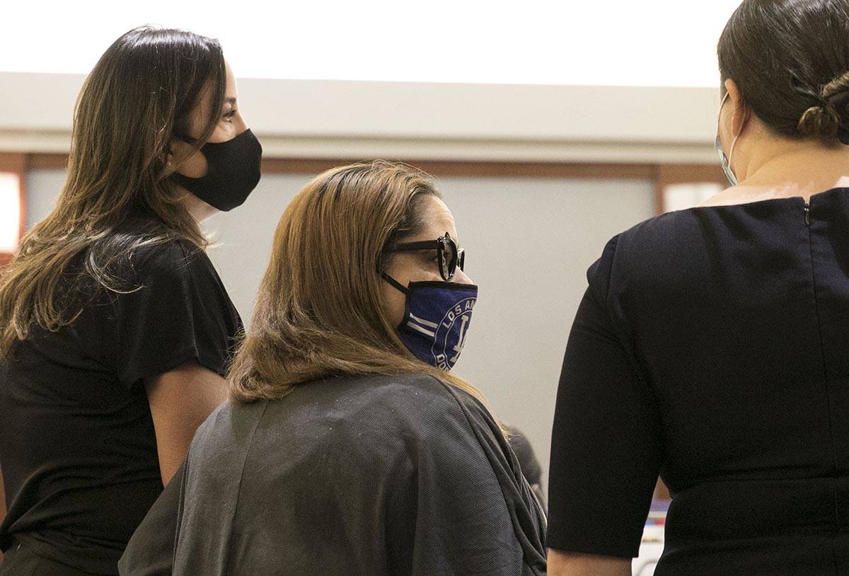 Malinda Mier, center, the co-defendant in the Alpine Apartments fire case, appears in court wit ...