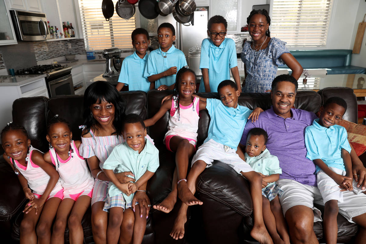 Some of the Derrico family, standing from left, Dallas, 8, Denver, 8, Derrick, 9, Darian 14, se ...