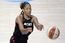 Las Vegas Aces forward A'ja Wilson (22) passes the ball during the second half of a WNBA basket ...