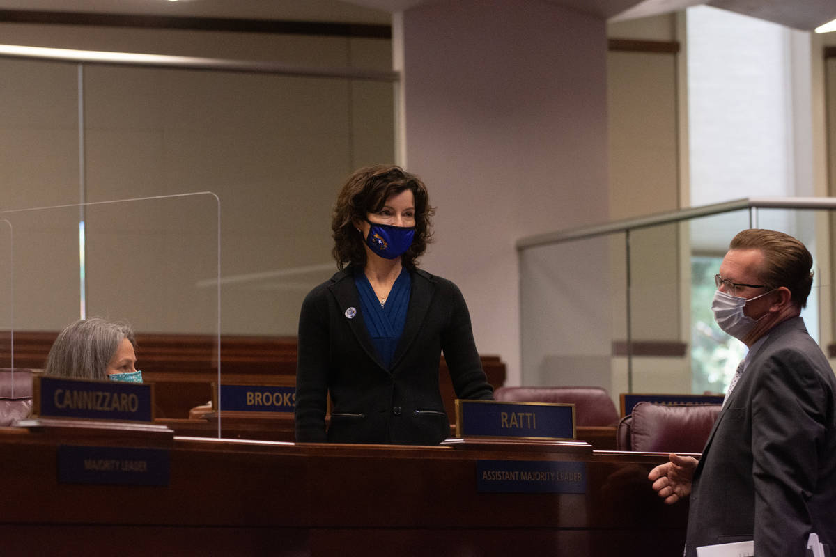 From left, Senators Julia Ratti, Heidi Seevers Gansert and Ben Kieckhefer on Wednesday, Aug. 5, ...