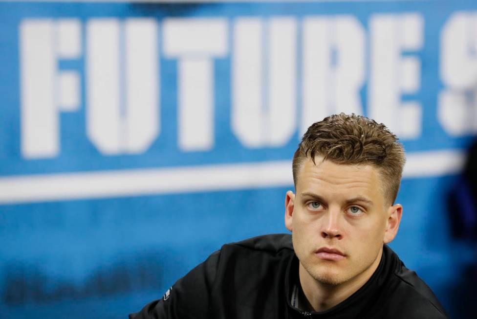 In this Feb. 27, 2020, file photo, LSU quarterback Joe Burrow watches a drill at the NFL footba ...