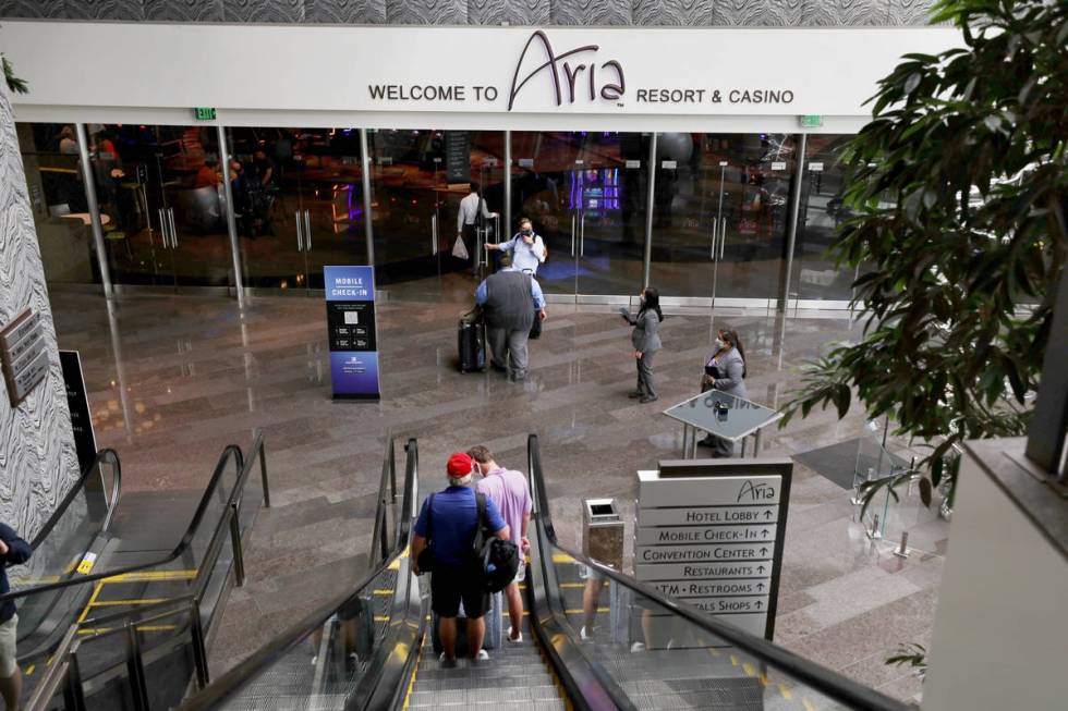 Guests enter Aria on the Strip, Thursday, Aug. 6, 2020, in Las Vegas. (Elizabeth Brumley/Las Ve ...