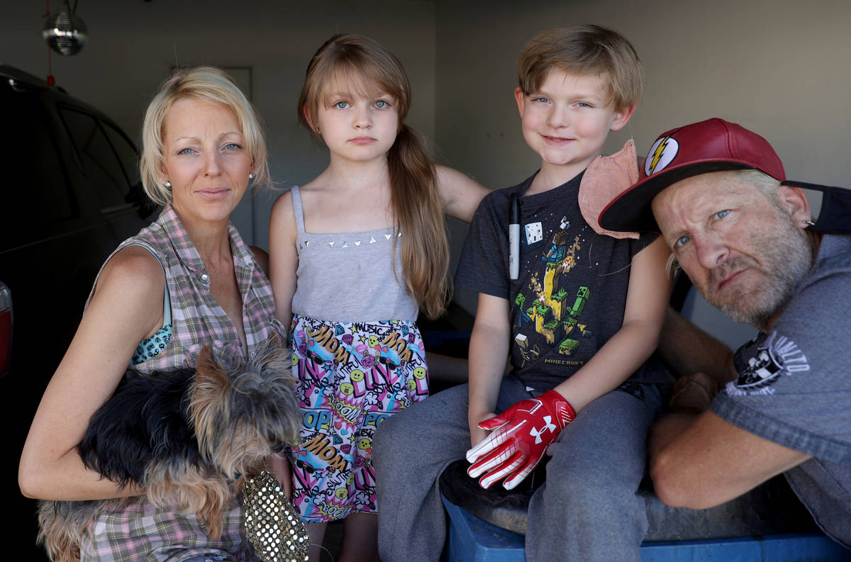 Entertainers Joe and Jessica Trammel with two of their children, Jett, 6, and June River, 10, a ...