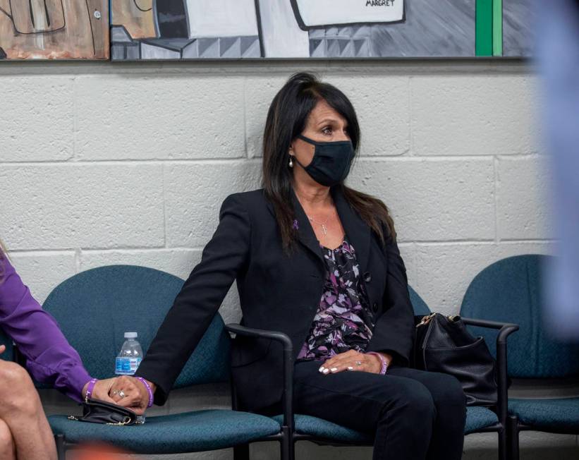 Rose Floyd listens as Nevada Attorney General Aaron Ford congratulates her during the announcem ...