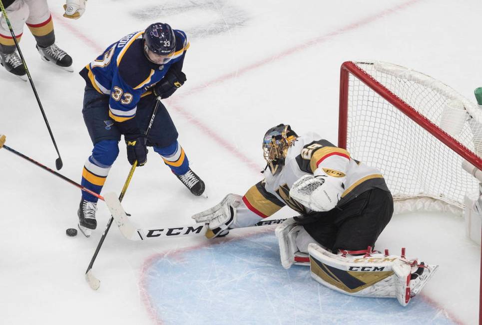 St. Louis Blues' Jordan Kyrou (33) is stopped by Vegas Golden Knights goalie Marc-Andre Fleury ...