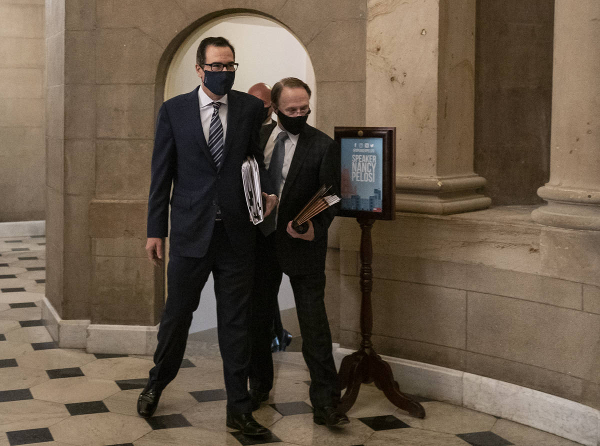 Treasury Secretary Steven Mnuchin arrives at House Speaker Nancy Pelosi's office on Capitol Hil ...