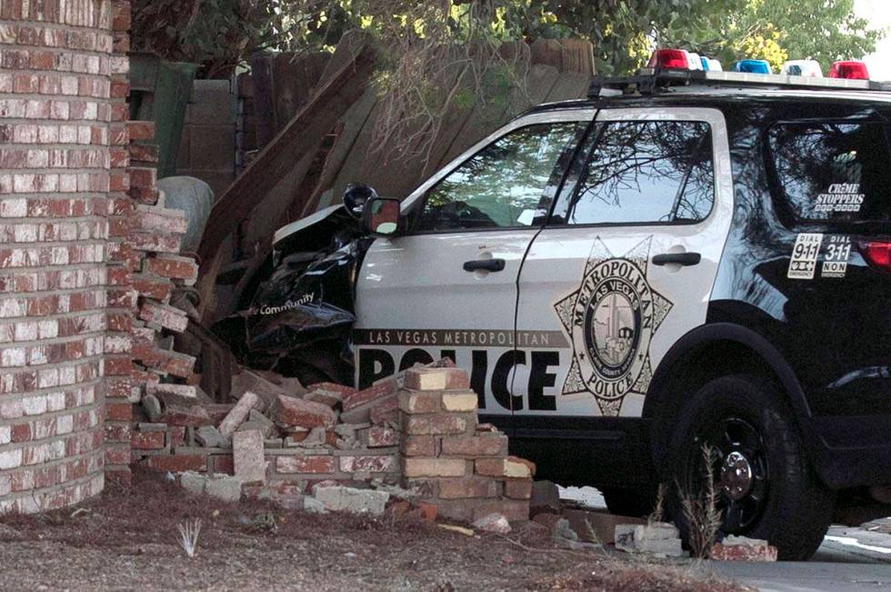 A Las Vegas police unit crashed into a wall during pursuit at Arville Street and El Camino Aven ...