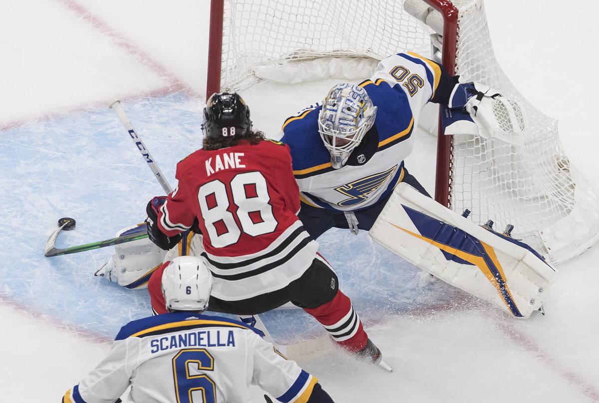 St. Louis Blues goalie Jordan Binnington (50) makes the save on Chicago Blackhawks' Patrick Kan ...