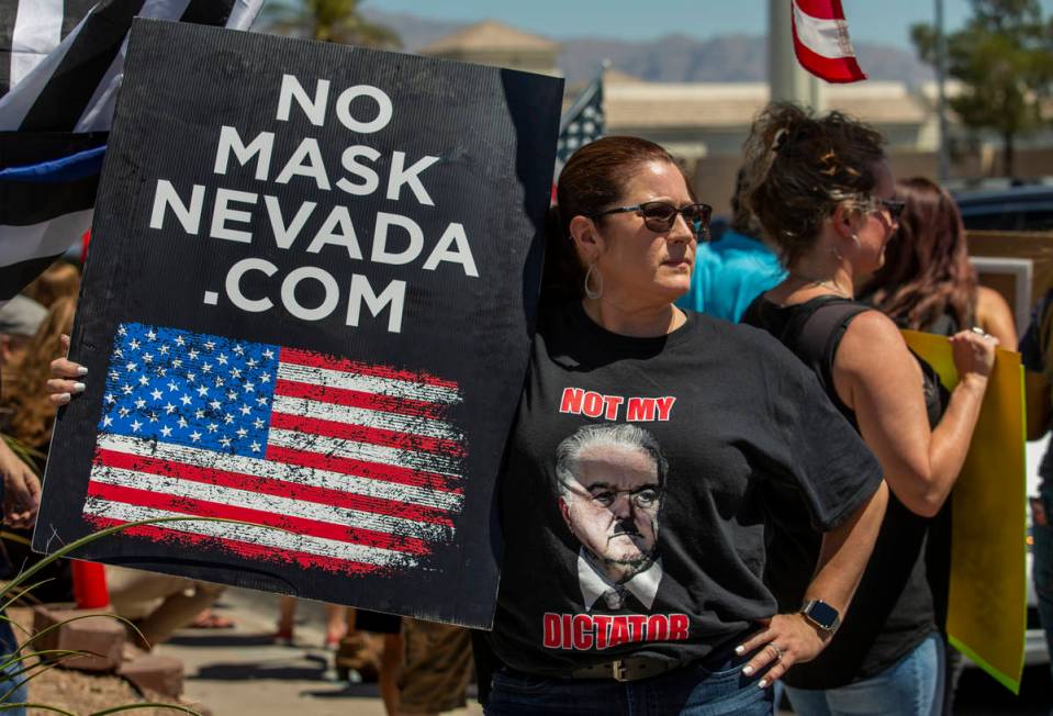 Organizer Melissa Blundo looks on during another No Mask Nevada rally to oppose the face mask m ...