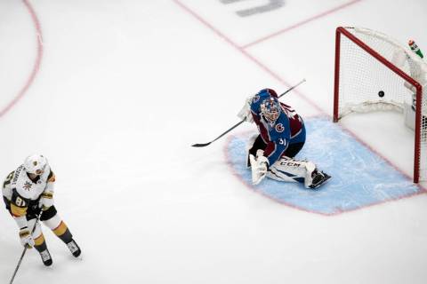 Colorado Avalanche goalie Philipp Grubauer (31) is scored against by Vegas Golden Knights' Jona ...