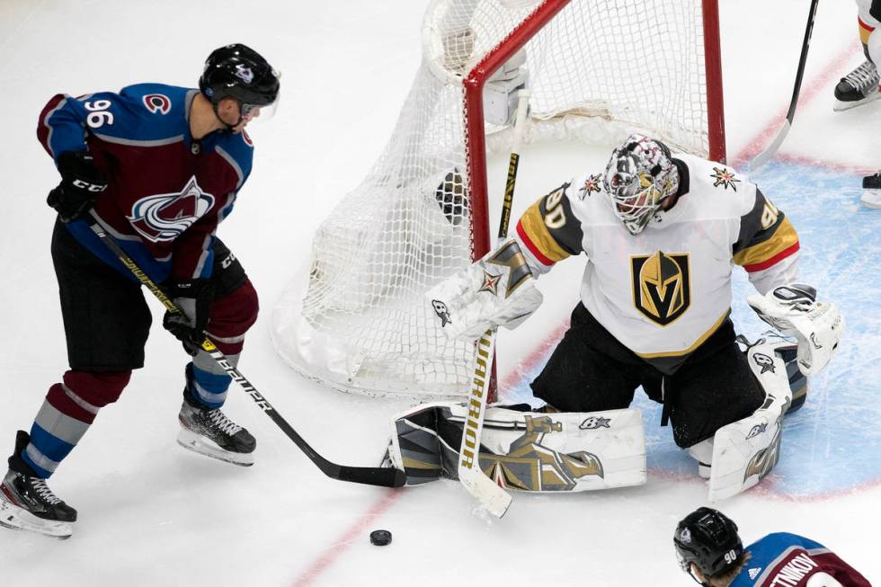 Colorado Avalanche's Mikko Rantanen (96) is stopped by Vegas Golden Knights goalie Robin Lehner ...