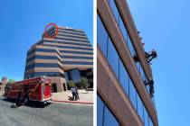 The scene at the US Bank where a window washer was stuck on the 10th floor from a mechanical ma ...