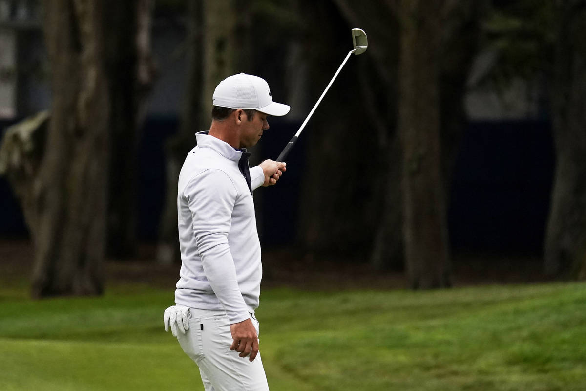 Paul Casey of England, celebrates after a birdie on the 12th hole during the final round of the ...
