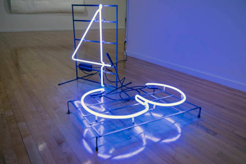 Javier Sanchez's neon metal piece titled "Ayotzi" is featured in the exhibit "Excerpts" at UNLV ...