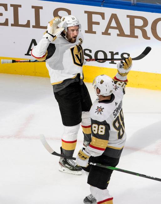 Vegas Golden Knights' Mark Stone (61) and Nate Schmidt (88) celebrate a goal against the St. Lo ...