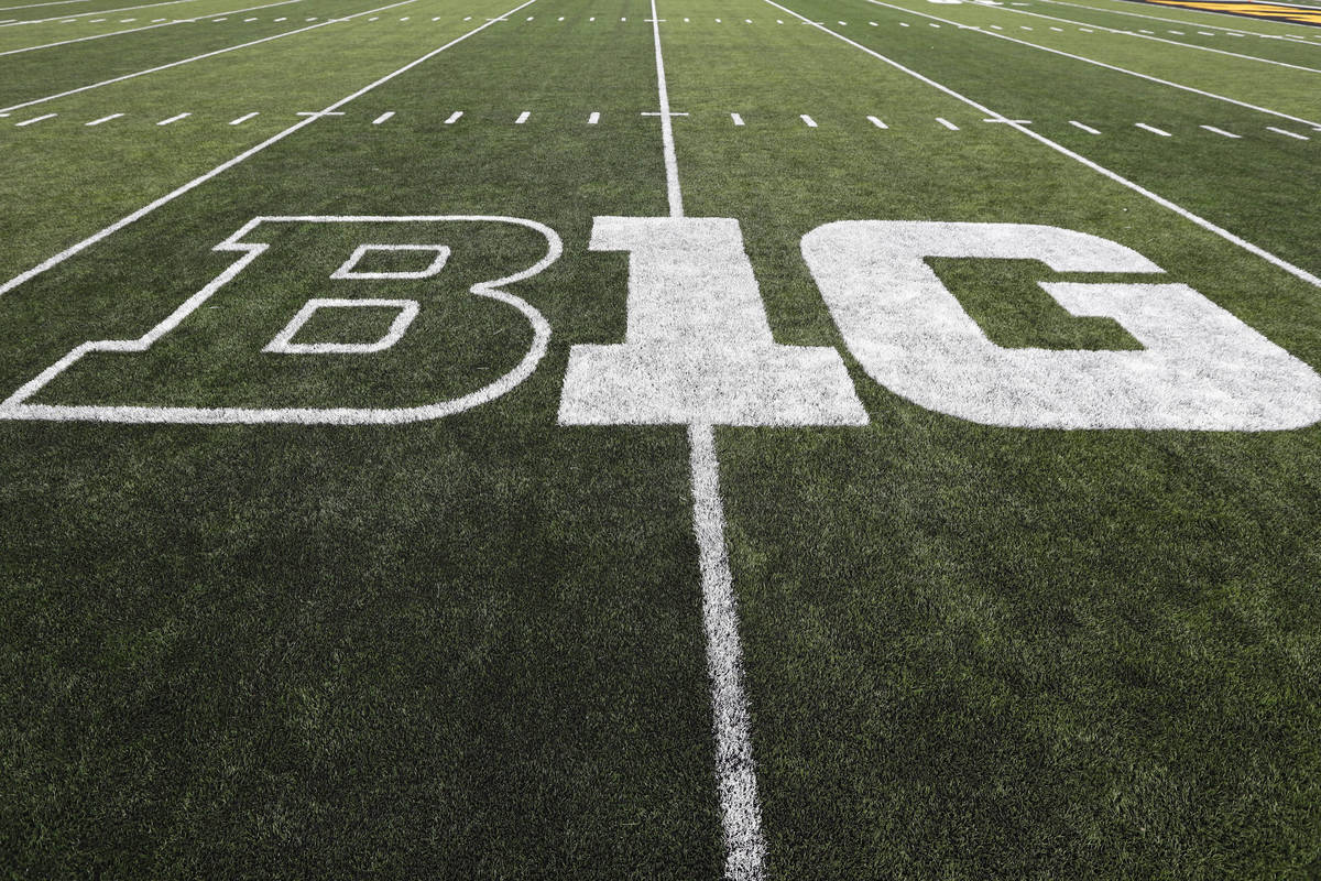 FILE - In this Aug. 31, 2019, file photo, the Big Ten logo is displayed on the field before an ...